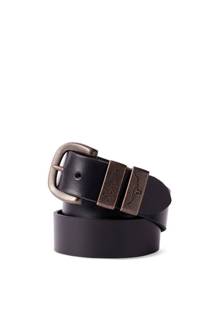The RM Williams Drover Belt is a coiled black pull-up leather belt with a silver buckle featuring engraved text and a small bull logo, plus metal accents, all displayed on a white background.