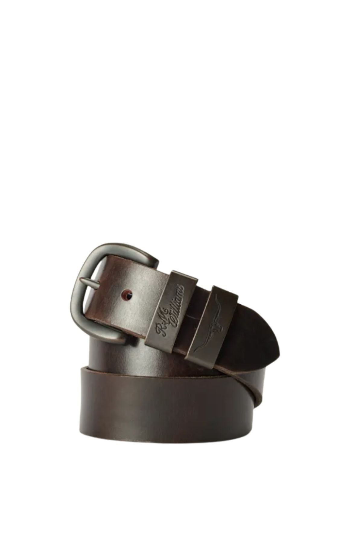 The RM Williams Drover Belt, coiled and dark brown with a silver buckle and engraved branding on the metal loop, is made in Australia and shown against a plain white background.