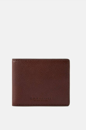 The RM Williams Farrier Slim Bi Fold Wallet is crafted from full grain pebbled leather and embossed with "R.M. Williams" and "South Australia" near the bottom. It features card slots and is shown closed against a plain white background.