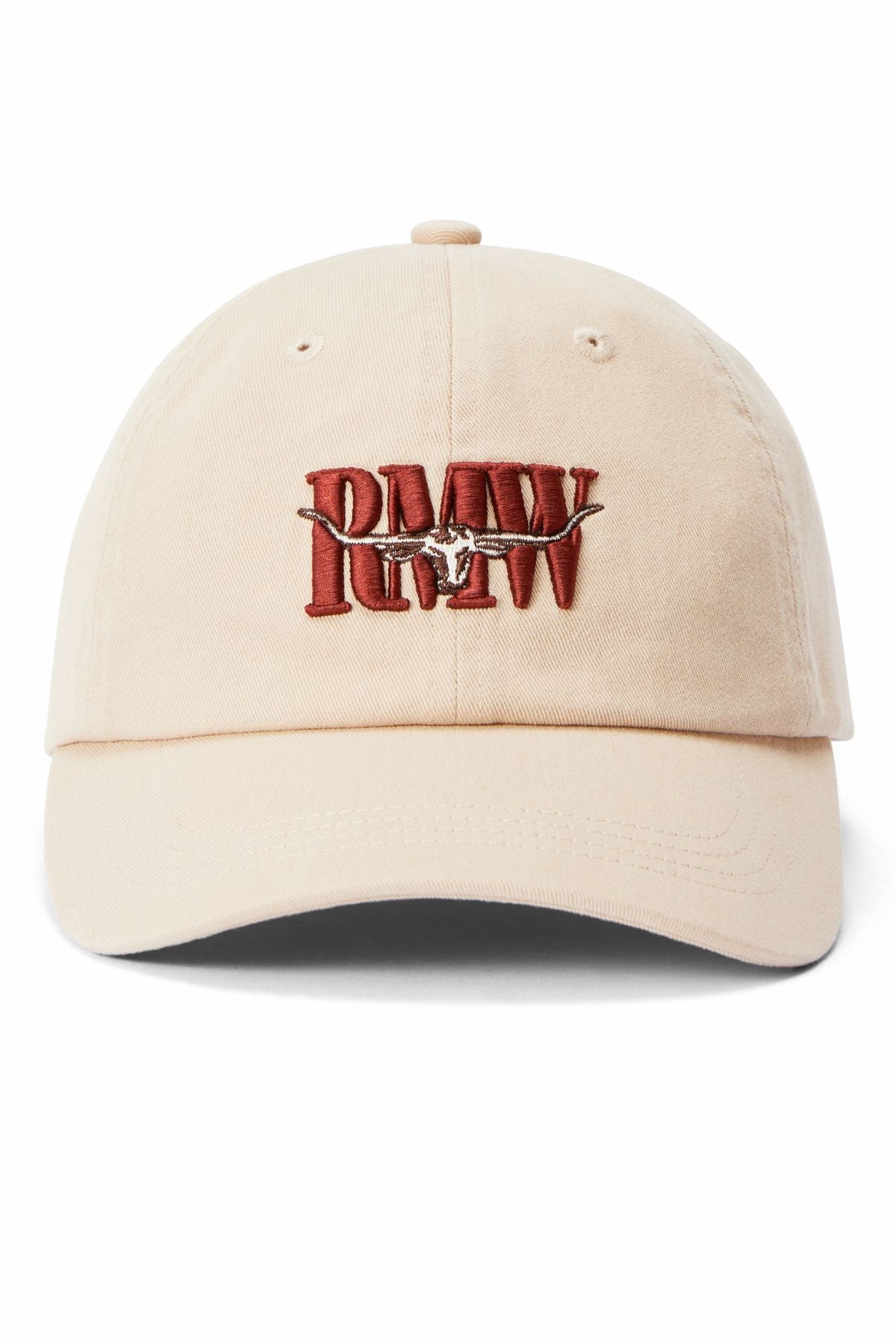 The RM Williams Heritage Twill Cap is a beige organic cotton cap with a red embroidered "RMW" heritage logo accented by a barbed wire design. It includes an adjustable strap for comfort.