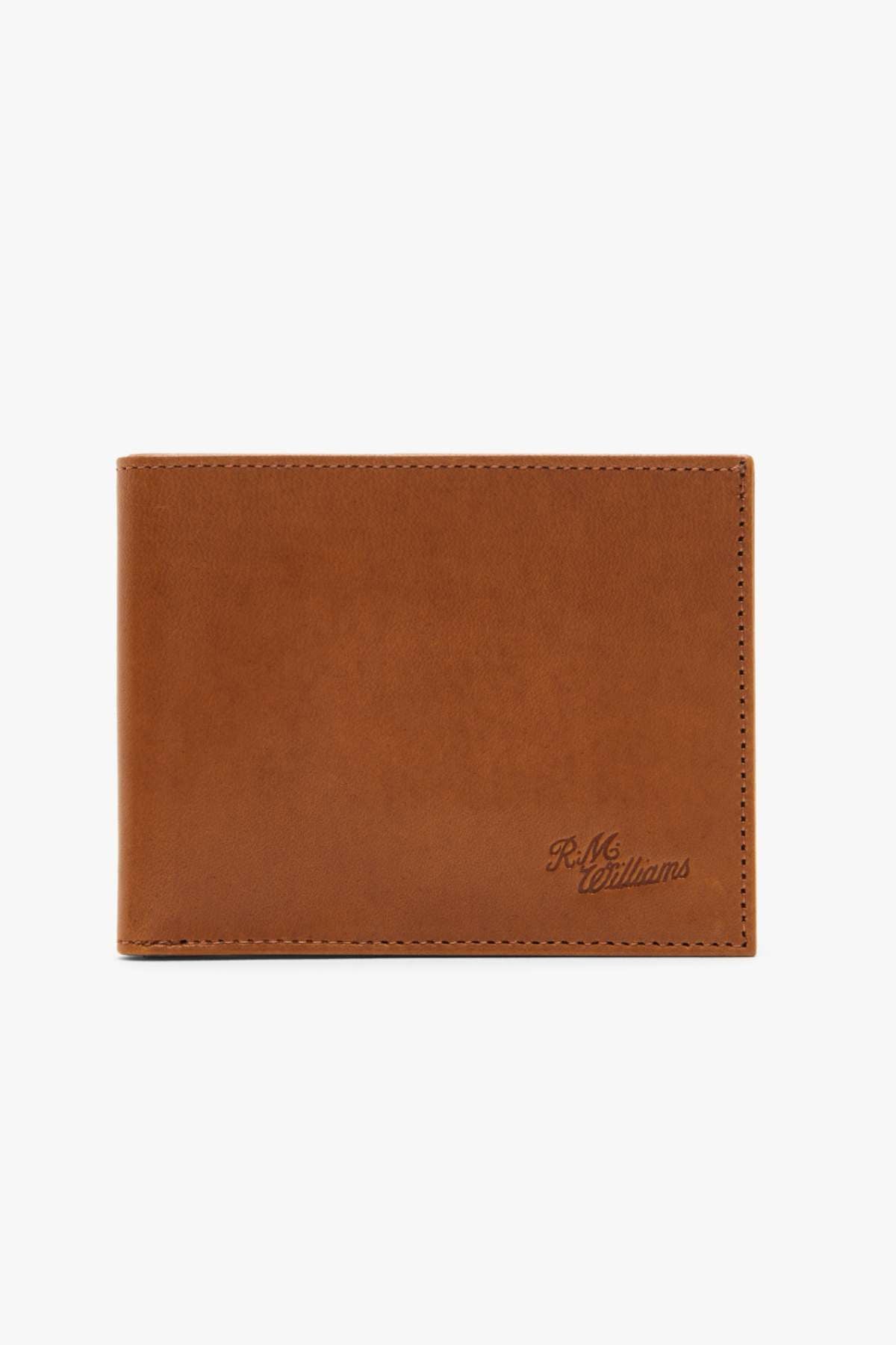 The RMW Singleton Wallet with Coin Pouch is crafted from brown calf leather and showcases a subtle embossed logo in the bottom right corner. Its RFID protection enhances the smooth texture and clean stitching around the edges, providing a stylish and secure accessory.