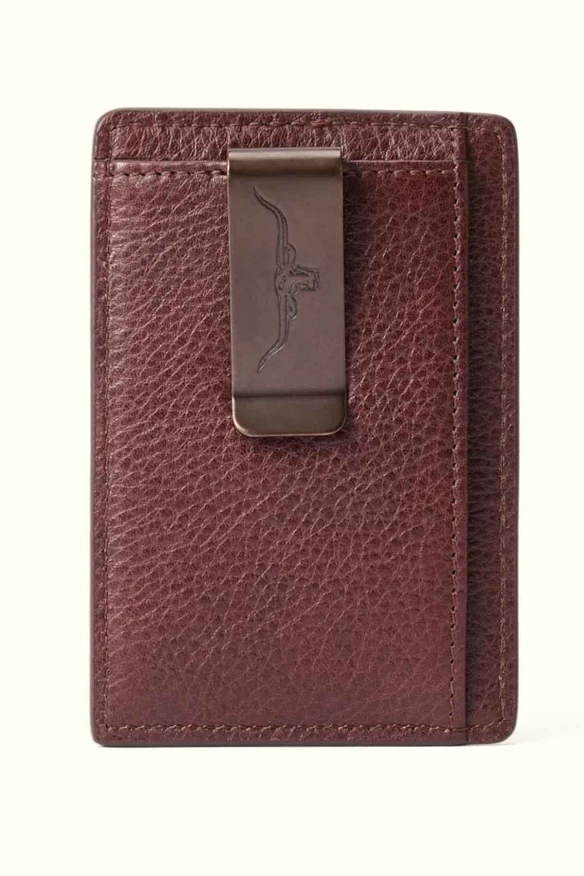 The RM Williams Farrier Cardholder with Money Clip features a luxurious textured brown leather finish, distinguished by an embossed longhorn emblem on its money clip. Its sleek, compact design stylishly accommodates both your cash and cards.
