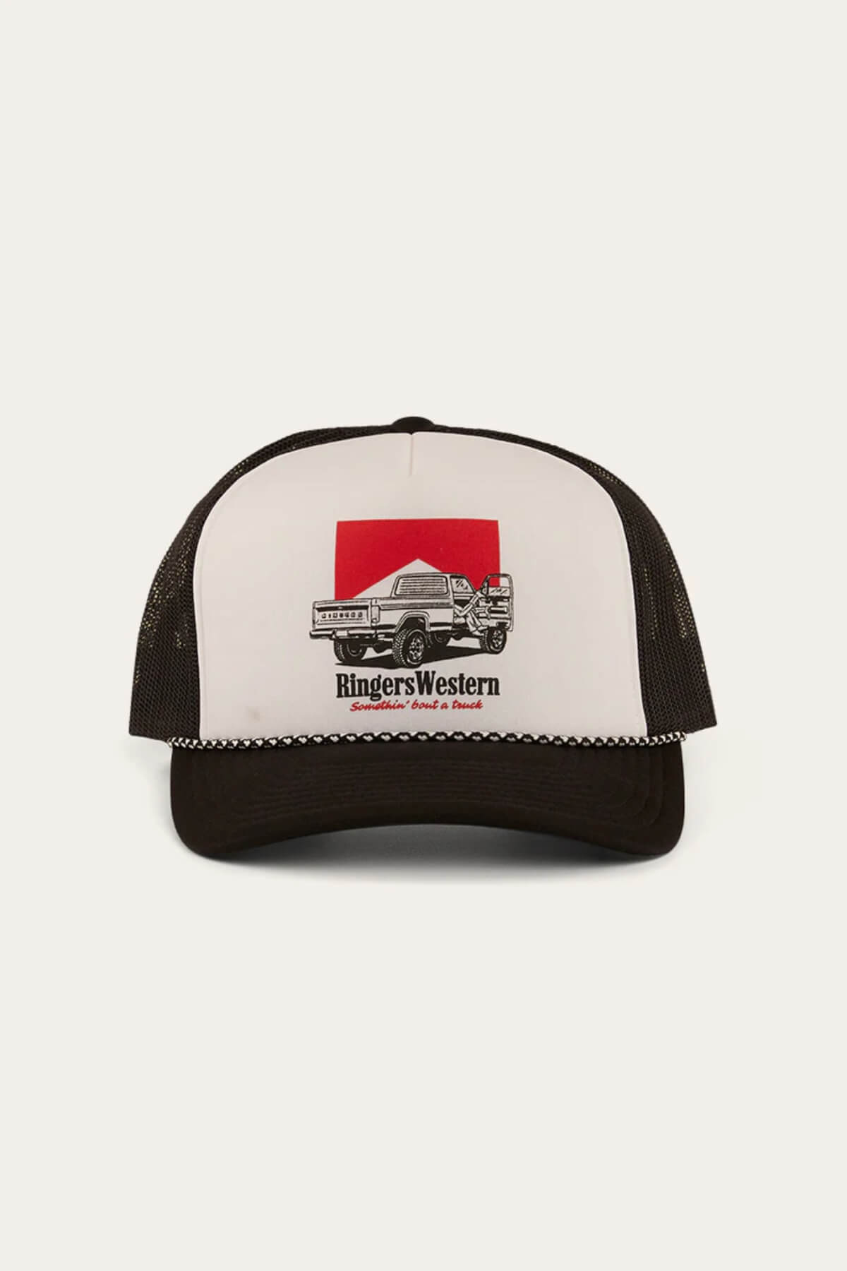 The Ringers Western Bout A Truck Trucker is a black and white mesh-back cap featuring a pickup truck and dog illustration, with "Ringers Western" text displayed on the front panel for breathable, stylish comfort.