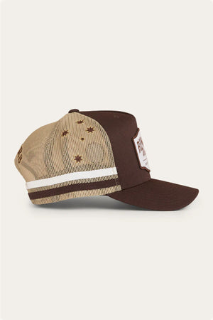 The Ringers Western Country Club Deep Fit Trucker Cap features a brown and beige design, flat brim, white stripes at the back with star-shaped cutouts, and a front rectangular patch—ideal for a classic country look.