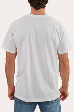 A person stands with their back to the camera, wearing a plain white Ringers Western Hastings Loose Fit T-Shirt and blue jeans. The 100% cotton jersey fabric drapes comfortably against a light beige background.