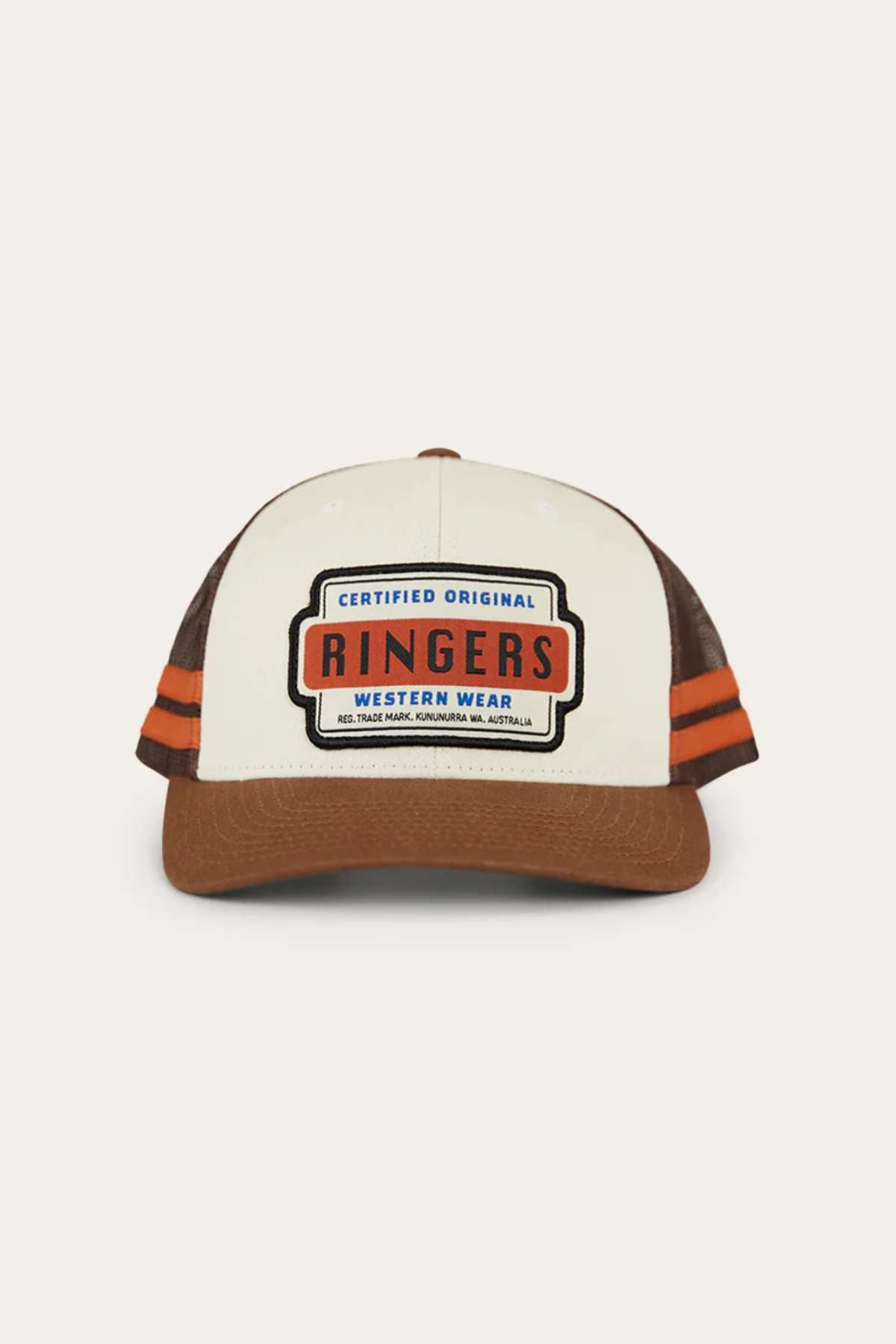 The Ringers Western Haulin Trucker Cap is brown and white with orange and brown stripes on the mesh back, features a large rectangular front patch reading "Certified Original Ringers Western Wear," and has an adjustable snapback.