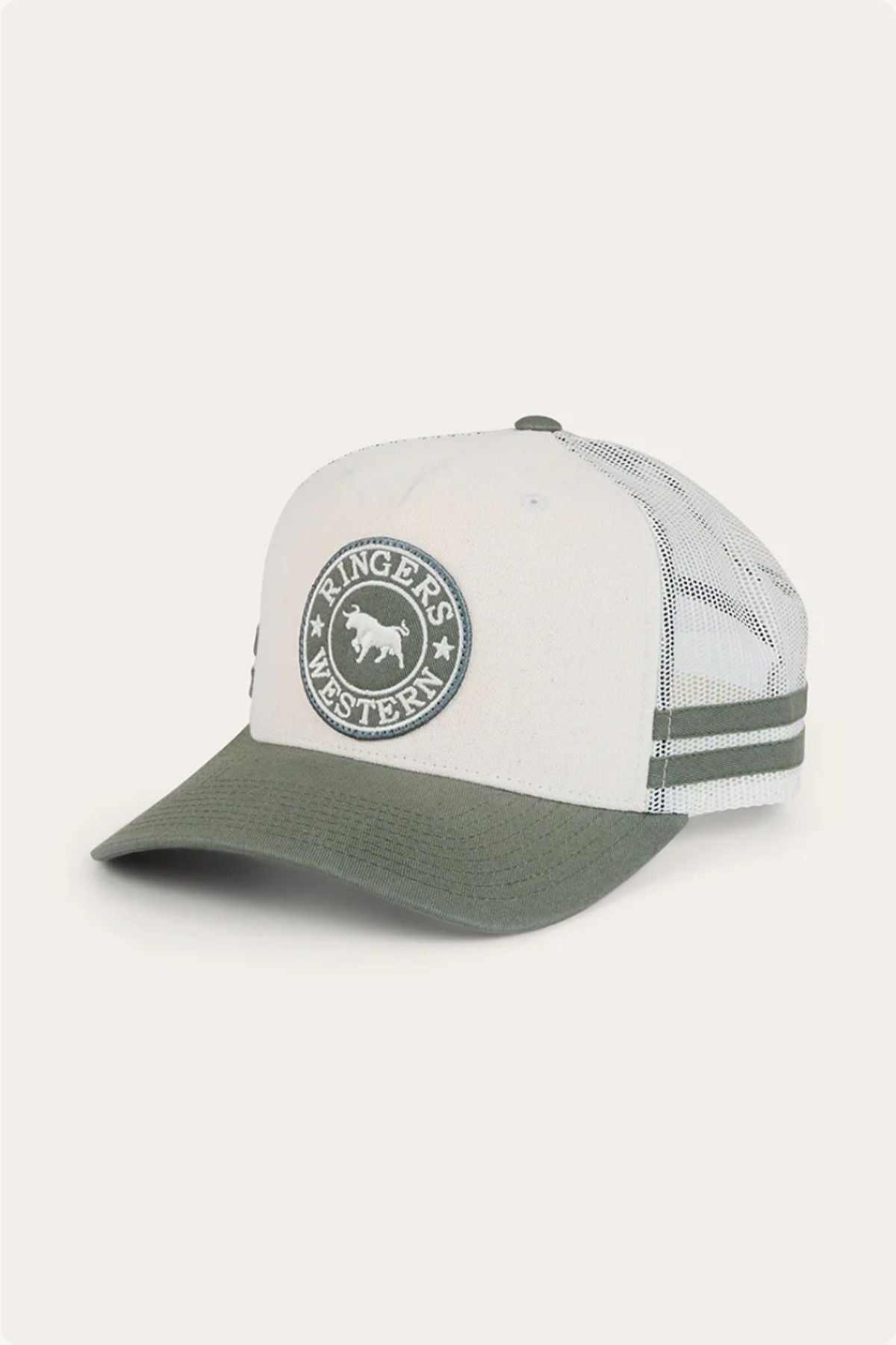 The Ringers Western McCoy Trucker Cap is a white and olive green cotton twill cap with a mesh back, featuring a round "Ringers Western" bull logo on the front panel.