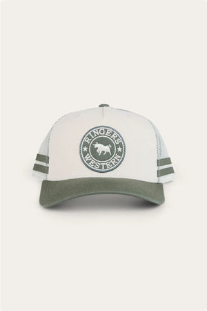 The Ringers Western McCoy Trucker Cap is a light grey and olive green cotton twill cap featuring "Ringers Western" and a bull logo embroidered on the front, two green side stripes, and an olive green brim.