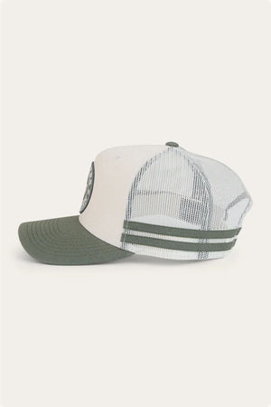 The Ringers Western McCoy Trucker Cap, with a white and green design, cotton twill front, mesh back, and curved green brim, is displayed from the side against a plain light background.