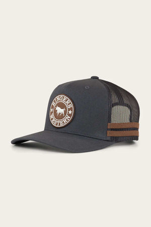 The Ringers Western McCoy Trucker Cap is a grey and black cotton twill cap with a round "Ringers Western" bull patch on the front, featuring a mesh back for ventilation and stylish brown stripes on the side.