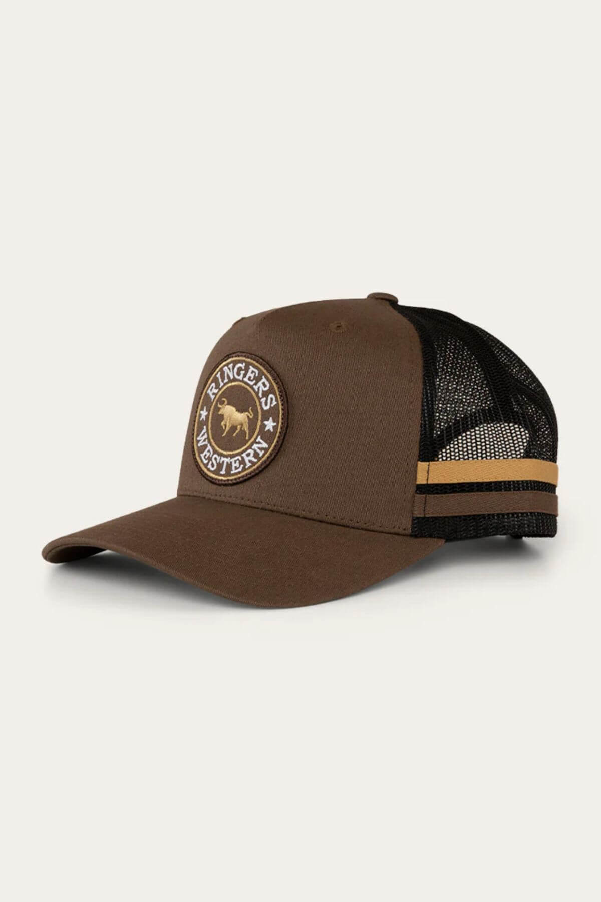 The Ringers Western McCoy Trucker Cap features a round logo patch with a steer and "Ringers Western" on its brown and black cotton twill front. It includes a curved brim and two tan stripes on the mesh back for style and breathability.