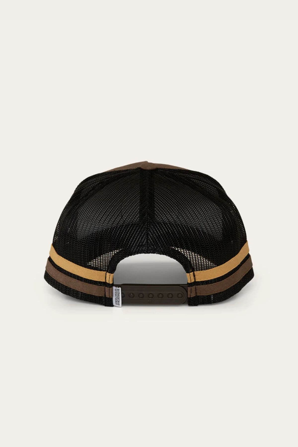 The image features the Ringers Western McCoy Trucker Cap's rear view with a black mesh back. It displays two horizontal tan stripes on a brown cotton twill background and has an adjustable snapback closure for easy sizing.