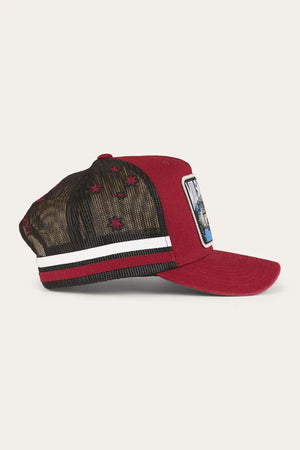 The Ringers Western Mud Sweat Beers Deep Fit Trucker Cap features a red and black design, white stripe, black mesh back, embroidered stars, and a front rectangular patch. Shown in side view on a light background.