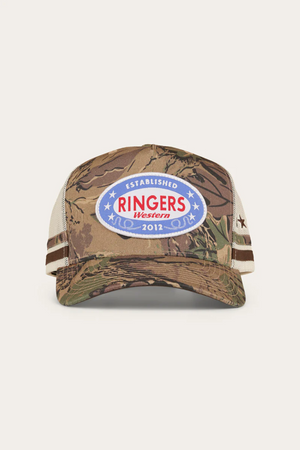 Front view of the Ringers Western Shooter Deep Fit Trucker Cap featuring a camo mesh back, large oval patch with "Established Ringers Western 2012" in red, white and blue, and an adjustable snapback closure.