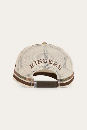 The Ringers Western Shooter Deep Fit Trucker Cap’s back features a beige mesh panel, brown "RINGERS" embroidery above the adjustable snapback, and a patterned strip along the bottom edge.