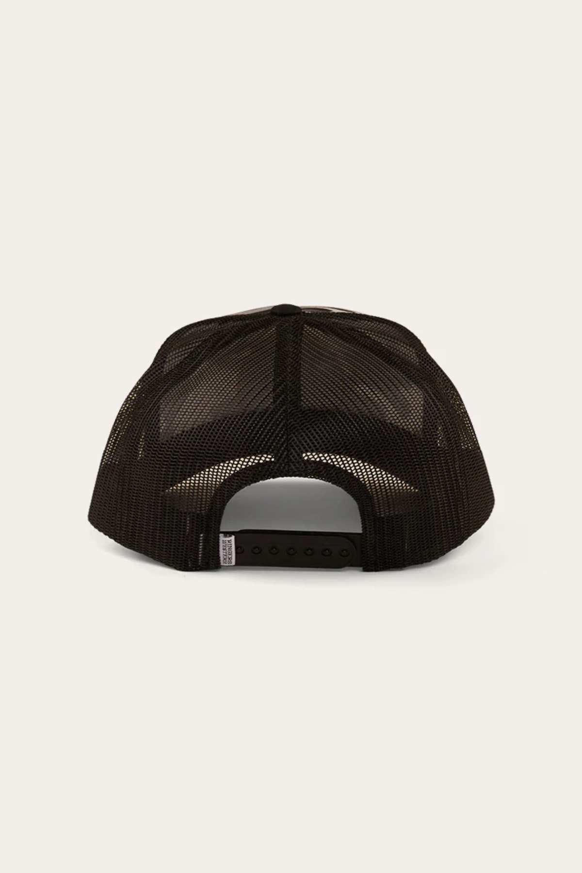 The Ringers Western Signature Bull Trucker Cap in black features a cotton twill front and mesh back, seen from behind to highlight its adjustable strap and snap closure.