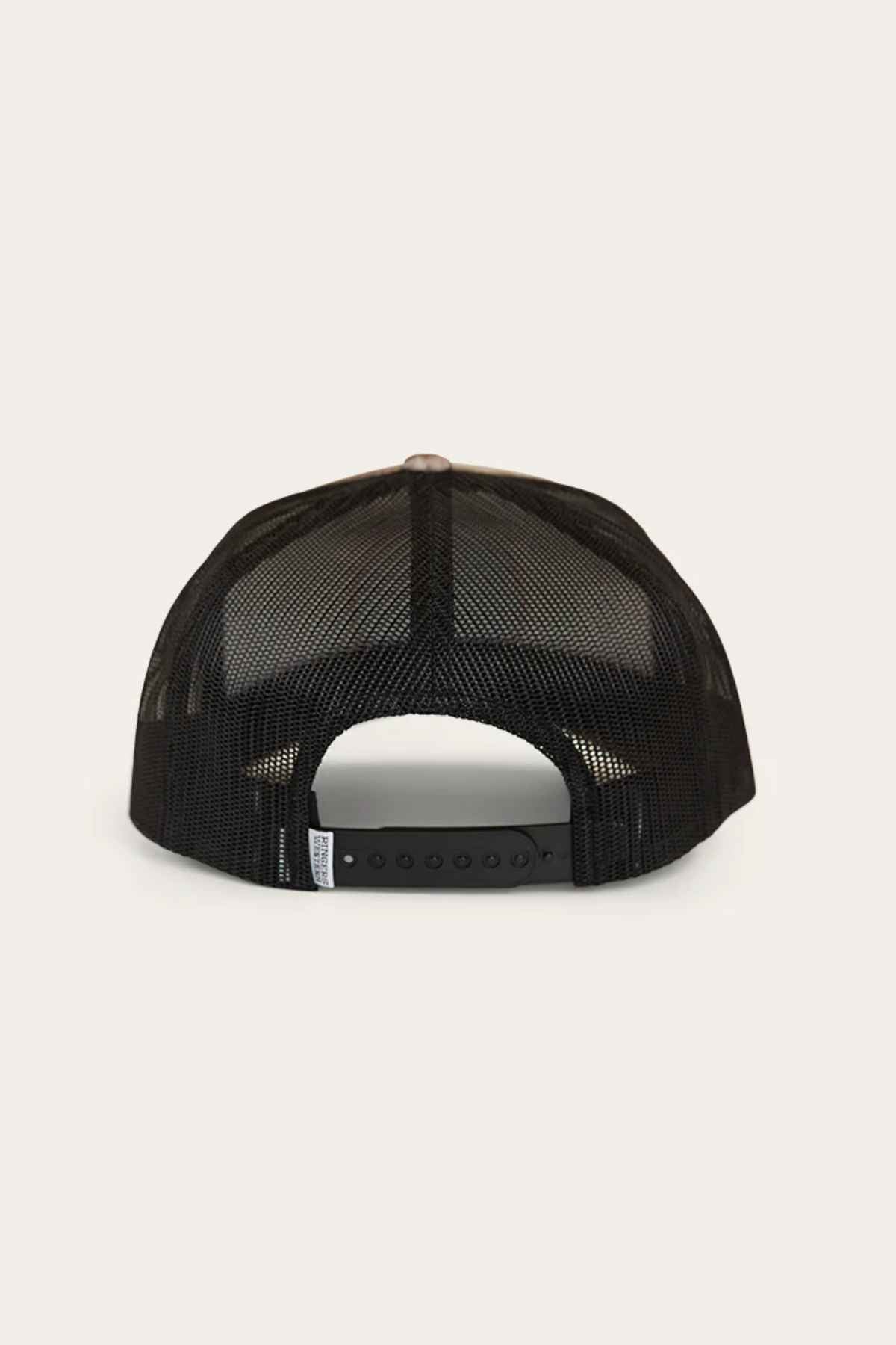 The Ringers Western Signature Bull Trucker Cap is displayed from the back, highlighting its black mesh design and plastic adjustable strap, capturing the rugged essence of Ringers Western.