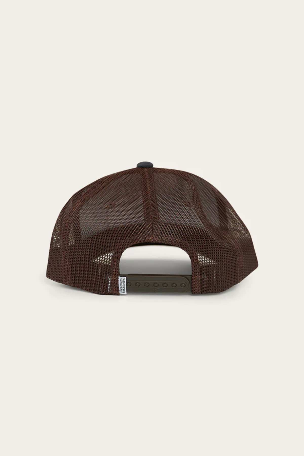 The image shows the back of a Ringers Western Wheatbelt Wool Trucker Cap with an adjustable green snapback, brown mesh, curved brim, and dark top button against a light gray background.