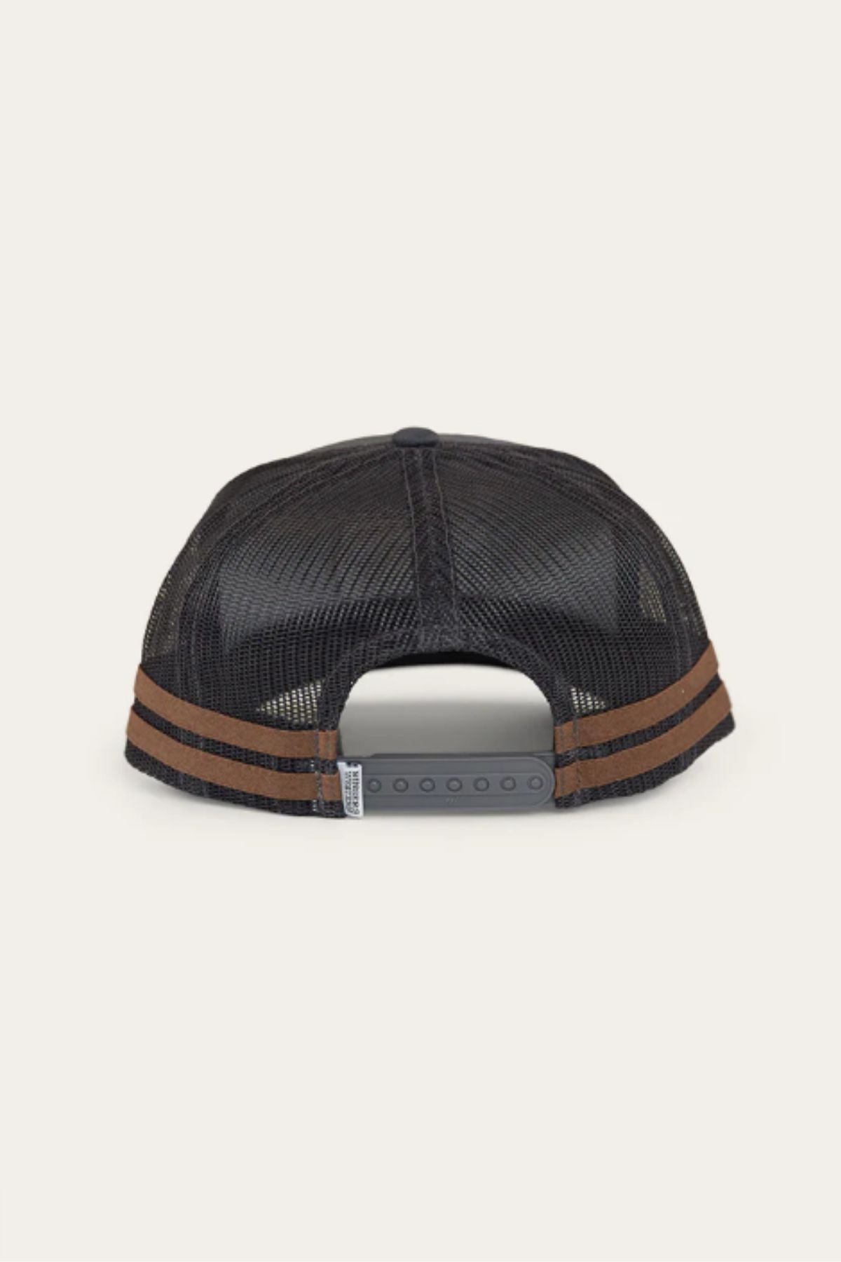 The Ringers Western McCoy Trucker Cap is shown from the back in black mesh, featuring two brown stripes and an adjustable gray snap-back closure.