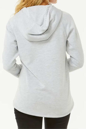 A person with blonde hair, seen from the back, wears a light gray Rip Curl Anti Series Flux III Zip sweatshirt with bonded polar fleece and black pants, standing against a plain white background.