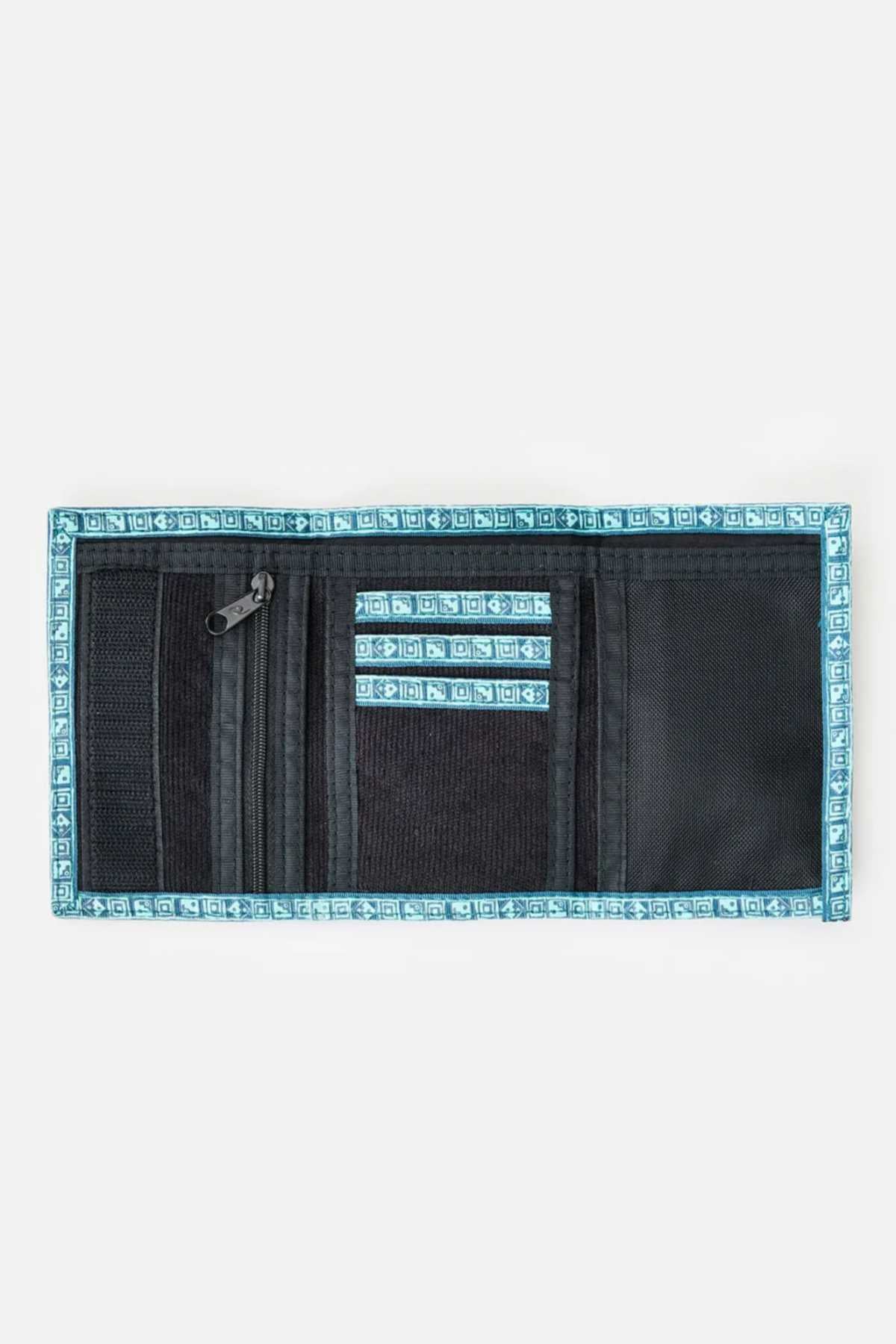 The Rip Curl Archive Cord Surf Wallet, a black rectangular wallet with blue, patterned trim, is open to reveal several compartments. It includes multiple card slots, a mesh pocket, and a zippered section for organizing personal items and cards. The surf wallet is displayed against a plain white background.
