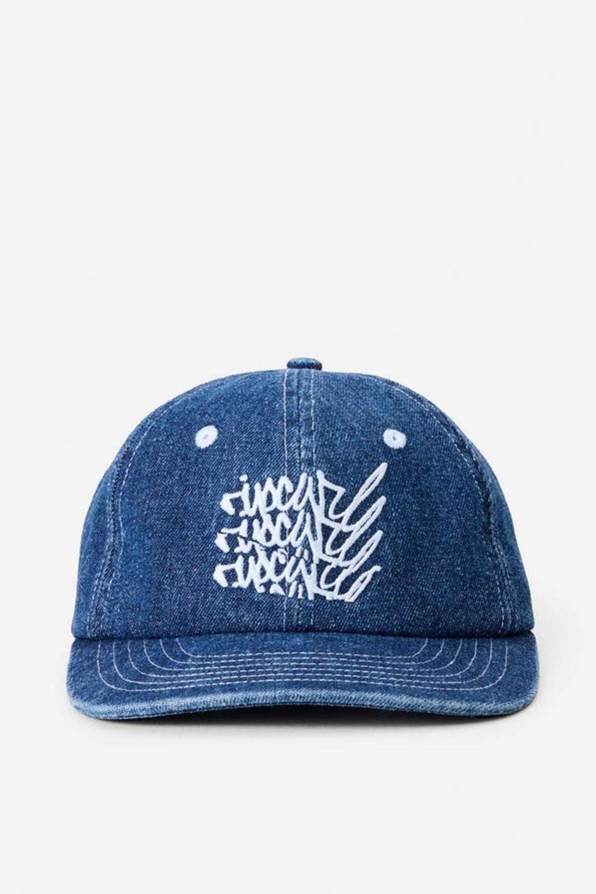 The Rip Curl Archive Denim SB Cap is a blue men's denim cap with abstract white embroidered text on the front, shown against a plain white background.