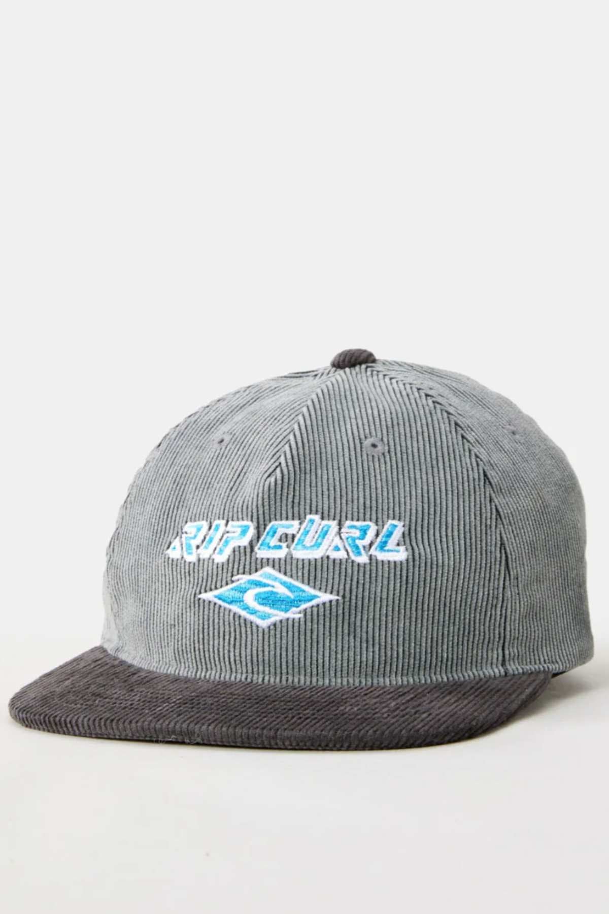 The Rip Curl Diamond Adj Cap features gray 11 wale cord fabric, a dark gray brim, and an embroidered white and light blue “RIP CURL” logo with wave design on the front.