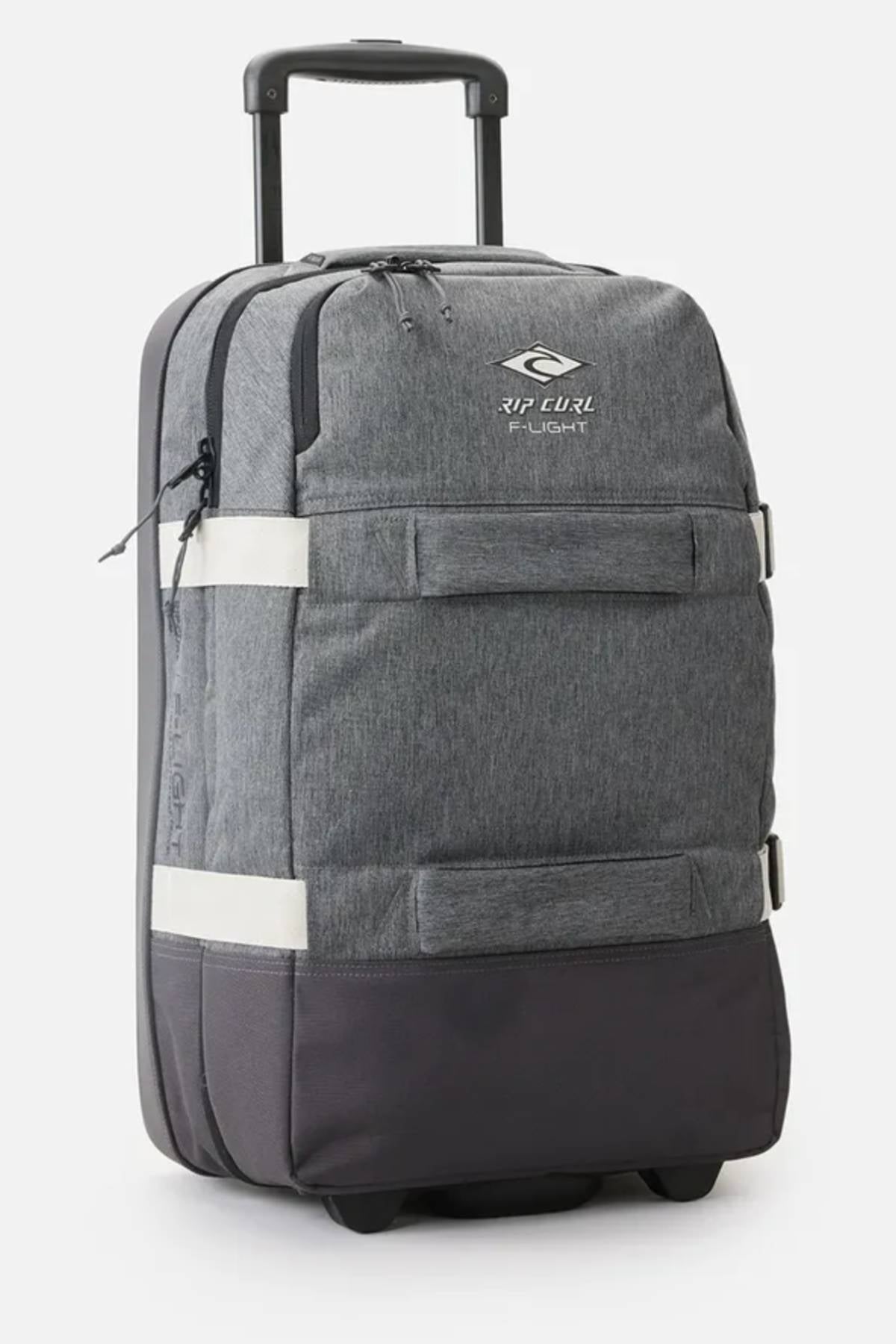 The Rip Curl F-Light 45L Classic Surf Transit Bag in gray with black accents offers a retractable handle, front zippered pocket, and two horizontal white straps. Made from recycled polyester, it's ideal for eco-conscious travelers.