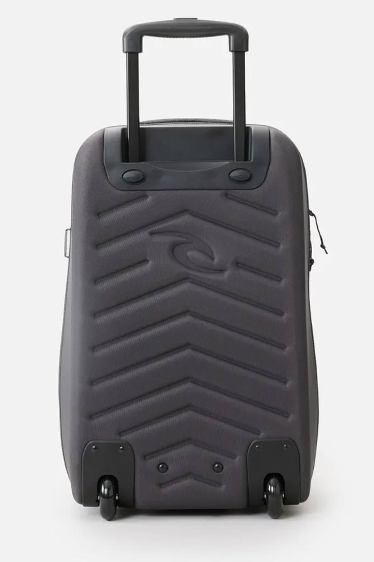 A gray rolling suitcase made from recycled polyester showcases a zigzag pattern on the front, with a telescopic handle and two wheels. Inspired by the Rip Curl F-Light 45L Classic Surf Transit Bag, it combines style with sustainability.