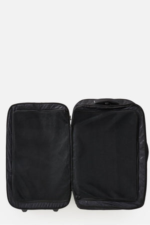 The Rip Curl F-Light Global 100L Bossa Nova, an open black check-in suitcase with two spacious compartments and zippered mesh covers, is displayed on a plain white background.
