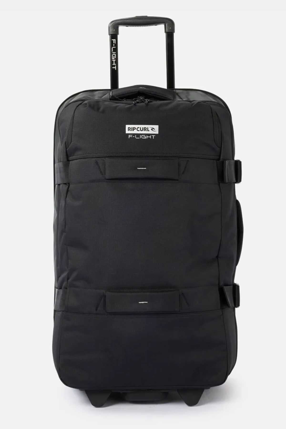 A black Rip Curl F-Light Global 100L Icons Travel Bag with an extendable handle at the top. This 100L travel bag features multiple straps, zippered compartments, and the Rip Curl Flight logo prominently displayed near the handle.