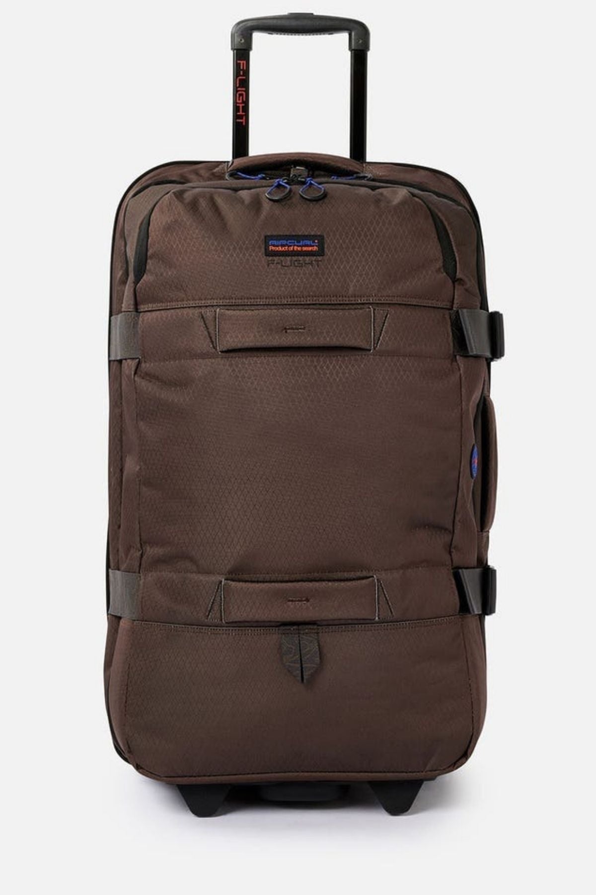 The Rip Curl F-Light Global 100L Search Travel Bag is a brown wheeled suitcase with a telescopic handle, made from recycled polyester. It has multiple compartments, buckles, and a small logo tag near the top, with textured fabric and is shown upright against a plain background.