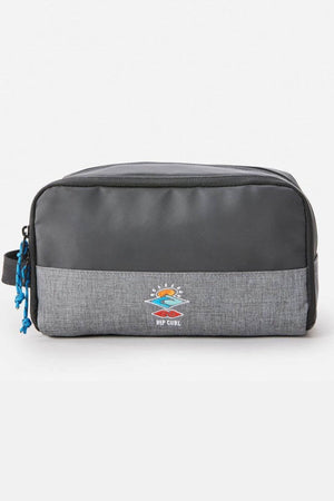 The Rip Curl Groom Toiletry Icons Of Surf bag, in gray and black with a colorful wave and sun logo on the front, is perfect for travel organization and shown against a white background.