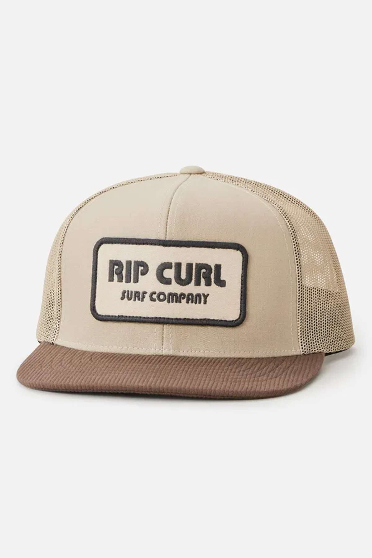 A tan and brown mesh baseball cap with an embroidered logo patch from the Rip Curl Icons Pump Trucker collection, featuring a brown brim and a tan mesh back for ventilation.