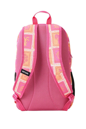 The Rip Curl Ozone 2.0 30L Backpack is ideal for school, boasting a pink design complemented by peach and yellow patterns along the sides. Made from recycled fabric, it features two adjustable pink straps and a top handle, with "Rip Curl" prominently displayed on one strap.