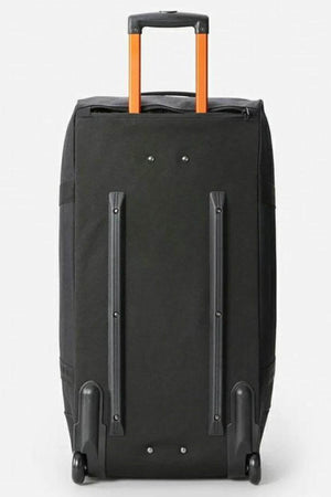 The Rip Curl Jupiter 80L IOS Bag is a large black rolling duffle with an extended orange handle and two wheels. Its water-resistant ripstop design ensures durability, ideal for travel or luggage storage.