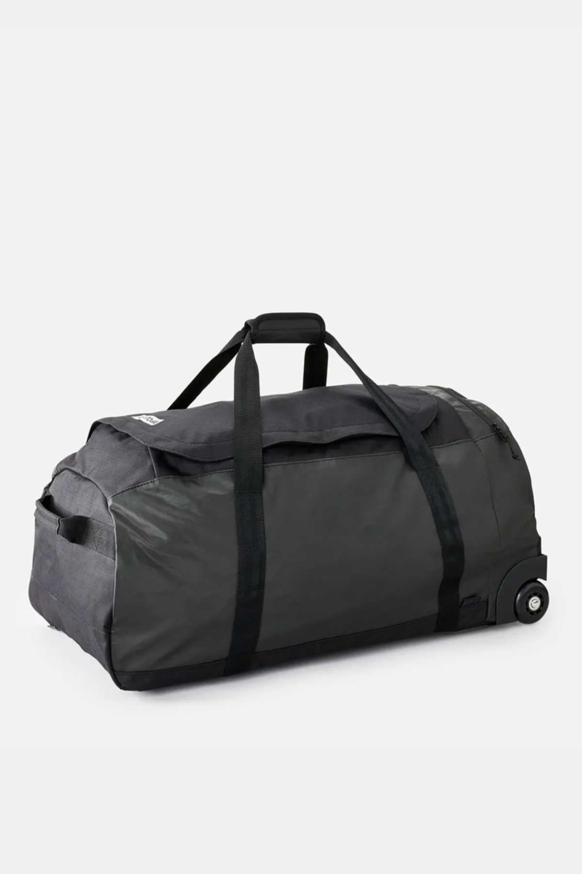 The Rip Curl Jupiter 80L Icons Travel Bag is a spacious black and dark gray duffle made from recycled polyester fabric. It has two sturdy handles, a small side zippered compartment, a shoe pocket, and wheels with a telescopic handle for effortless rolling, making it perfect for travel.