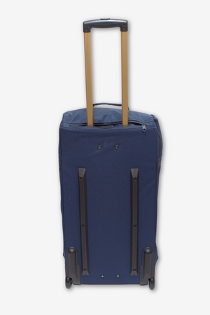 A** Rip Curl Jupiter 80L Mixed Travel Bag is shown standing upright, featuring a blue color, extended telescopic handle, and protective corner guards at the base. The bag also boasts two vertical reinforced bars on the backside and lightweight construction.**