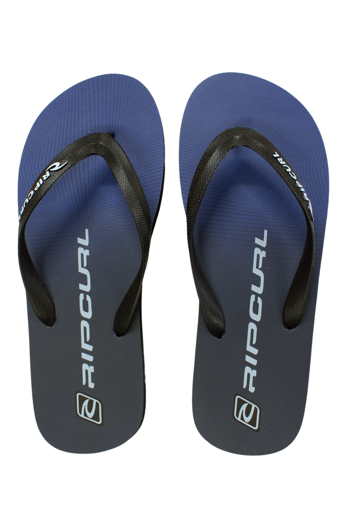 The Rip Curl Max Shock Bloom Thongs have ergonomic molded black straps, BLOOM algae foam for comfort, and a blue design with the "Rip Curl" logo in white on each sole, offering style and eco-friendliness.