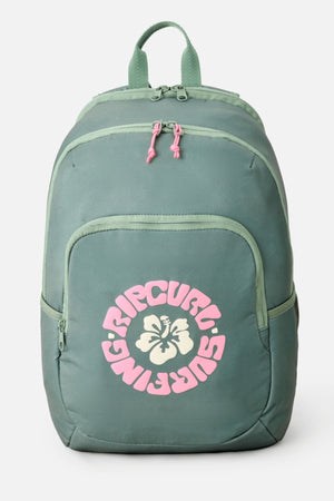 The Rip Curl Ozone 2.0 30L Backpack is green with a top handle, two zippered compartments, and pink zipper pulls. The front pocket shows a large pink and white "Rip Curl Surfing" logo around a hibiscus flower.