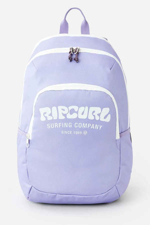 The Rip Curl Ozone 2.0 30L Backpack, in a light purple polyester design, showcases white accents along with the text "Rip Curl Surfing Company Since 1969" on the front. This versatile backpack features two main compartments with zipper closures and a top handle for convenient carrying.