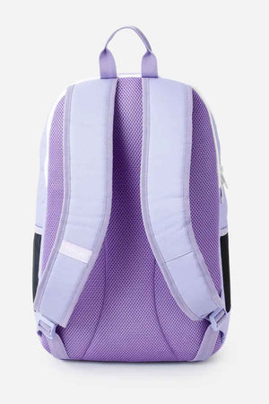 The Rip Curl Ozone 2.0 30L Backpack in lavender and purple offers ultimate comfort with its padded straps and mesh back panel. It includes side pockets, a top loop for hanging, and is made from durable polyester, making it a stylish choice against a plain white background.