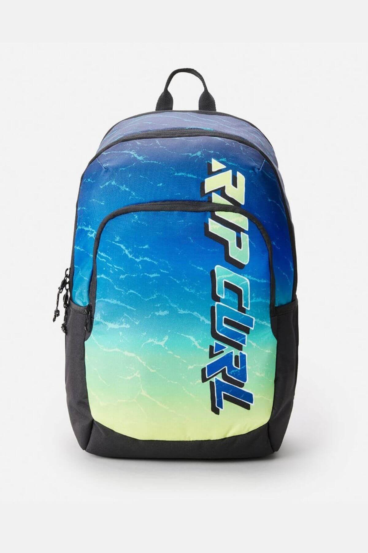 The Rip Curl Ozone 30L Faded Slant Backpack features a blue-yellow gradient, black sides and straps, front zip pocket, bold RIP CURL lettering, and an internal laptop section for added convenience.