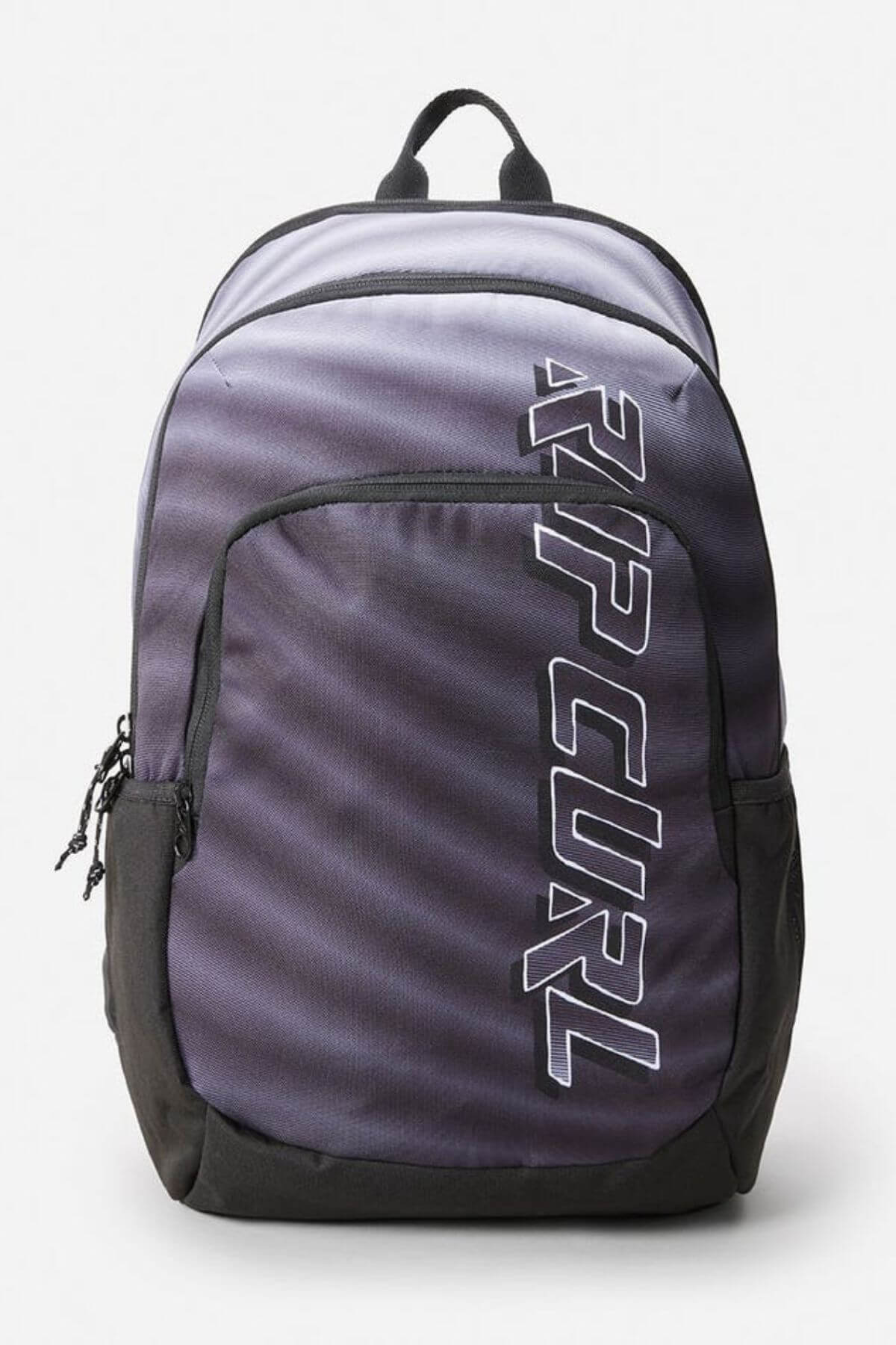 The Rip Curl Ozone 30L Faded Slant Backpack features a sleek black and gray design with bold white branding, a main compartment with a laptop section, front pocket, breathable straps for comfort, and a sturdy top handle.