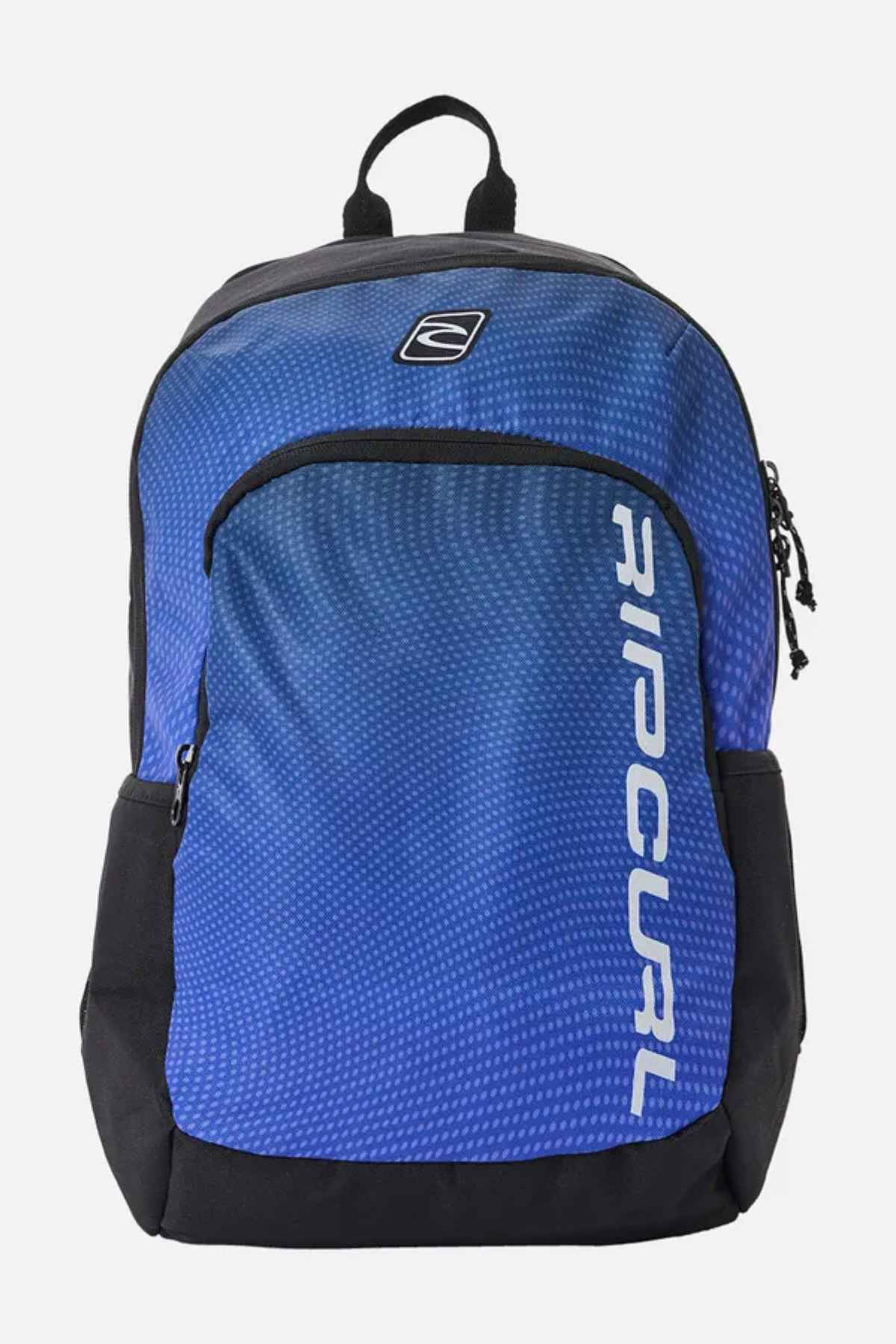 The Rip Curl Ozone 30L School Backpack, made from recycled polyester, features an eye-catching blue and black design with "RIP CURL" in white letters. It provides a generous 30L capacity with a zippered main compartment, a smaller front pocket for essentials, and a top handle for easy carrying.
