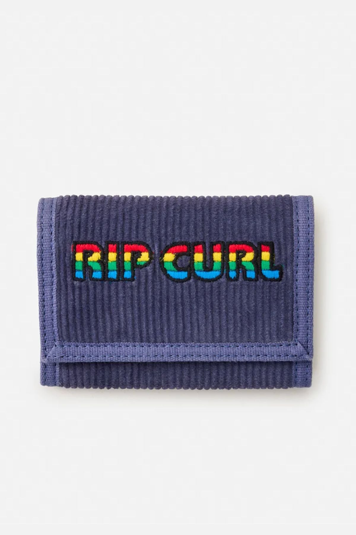 The Rip Curl Revival Cord Surf Wallet is a blue corduroy wallet with bold "RIP CURL" embroidery on the front and a secure Velcro closure for your essentials.