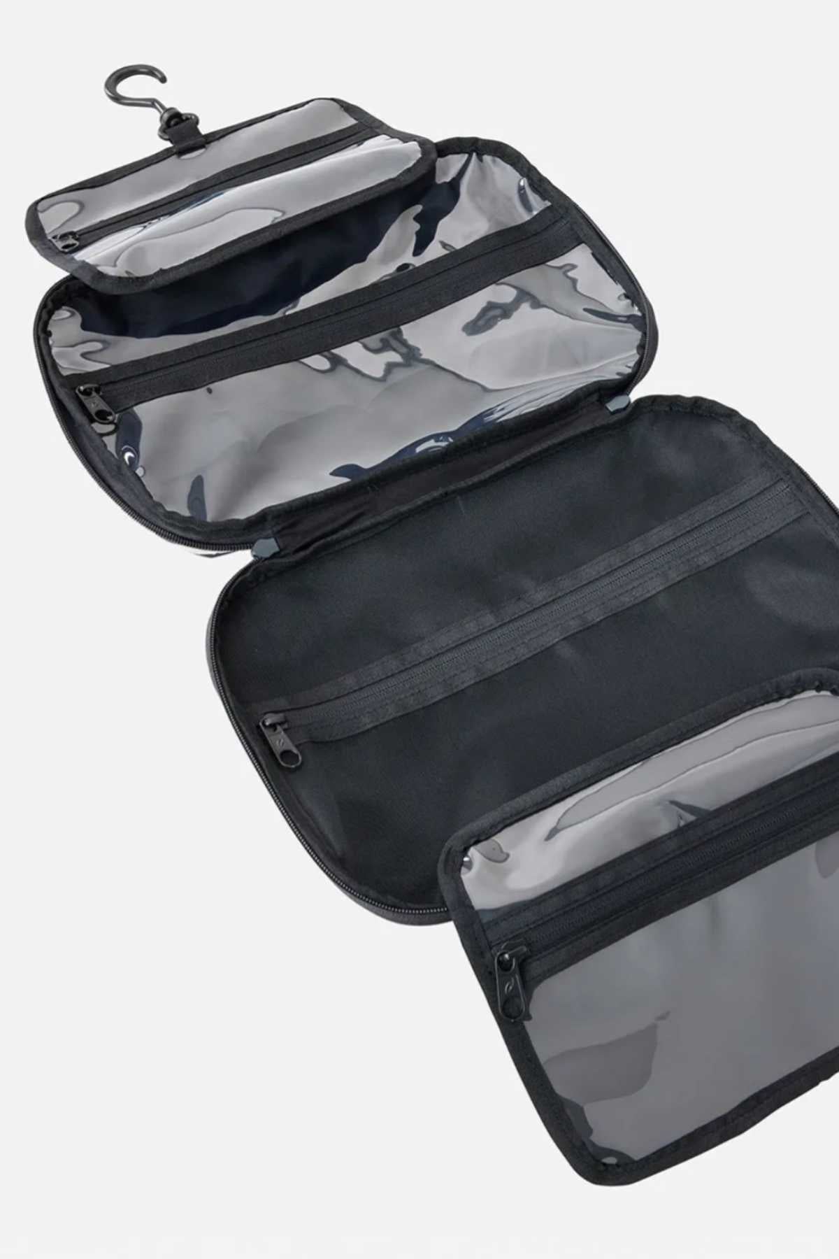 A sleek black Rip Curl Ultimate Beauty Case with multiple transparent zippered compartments is displayed open against a white background. This travel companion, equipped with a hook at the top for hanging, provides versatile storage sections ideal for organizing your beauty essentials.