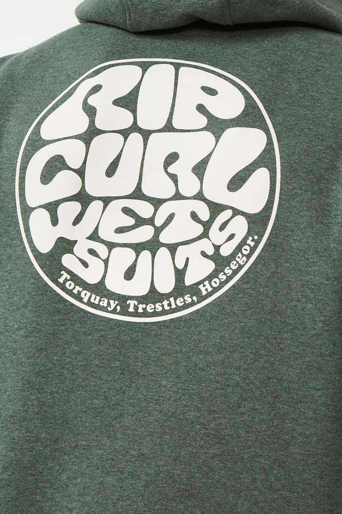 The Rip Curl Wetsuit Icon Hood hoodie features a large circular logo on the back with "Rip Curl Wetsuit" in bold, wavy font. Made from organic cotton poly fleece, it lists "Torquay, Trestles, Hossegor" beneath the main design.