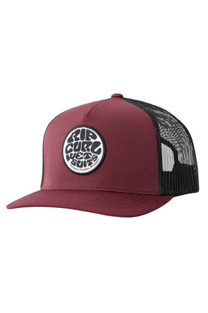 A maroon and black Rip Curl Wetsuit Icon Trucker hat, featuring a circular patch on the front with "RIP CURL NEXT SONS" and a mesh back. Perfect for outdoor activities, it has a flat brim, solid maroon front panel, and is made from recycled polyester twill.