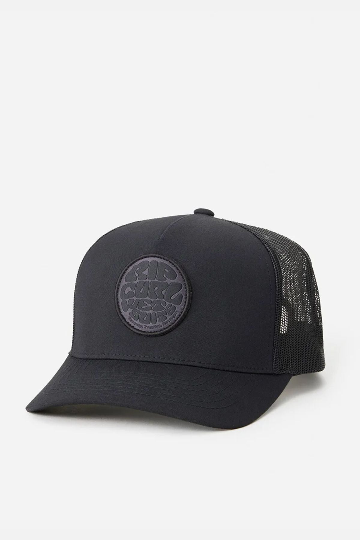 The Rip Curl Wetsuit Icon Trucker is a black cap with a mesh back and circular embroidered front logo patch, made from recycled polyester for outdoor activities, shown on a plain white background.